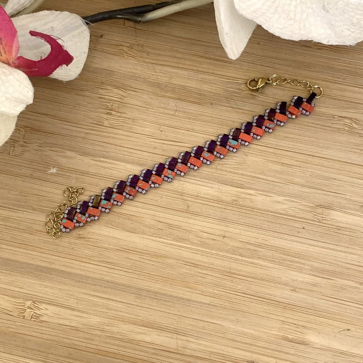 bracelet ajustable en perles miyuki tila orange veinée de turquoise tissé à la main.jpg bracelet ajustable en perles miyuki tila orange veinée de turquoise tissé à la main.jpg